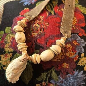 Twine & Twig Shell Necklace with chocolate brown leather strap.